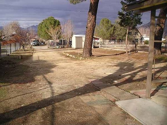 Large fenced front yard