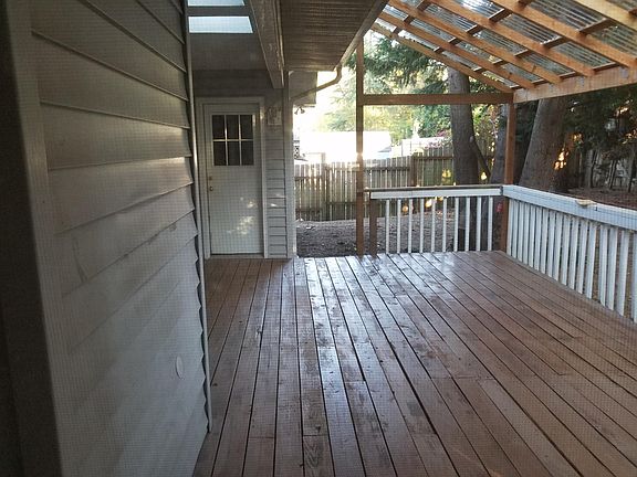 back deck, with wheel chair ramp, master bed room door,