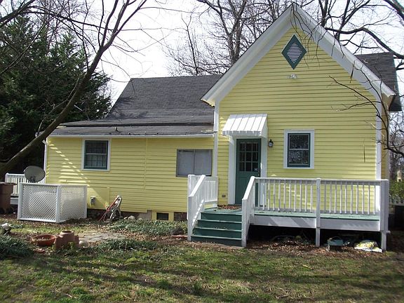 Rear of house with sitting deck