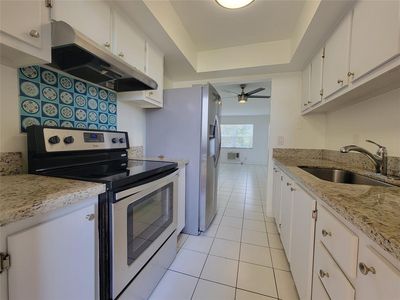1050 E Sample Road #203, Pompano Beach, FL, 33064