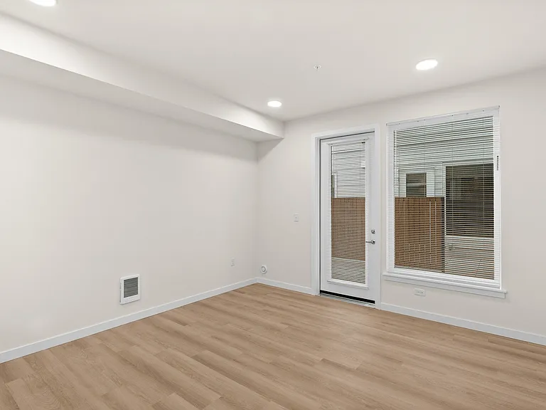 Bright open living with modern finishes + easy patio access Bright open living with modern finishes + easy patio access