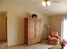 Living Room with Vaulted Ceiling and adjacent Patio