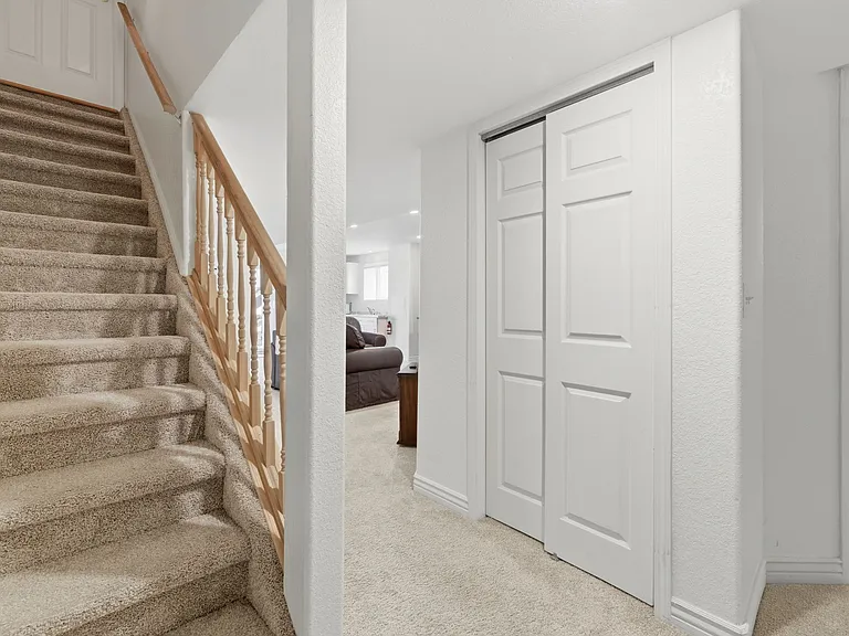 Stairs to upstairs unit. Locked door between units.