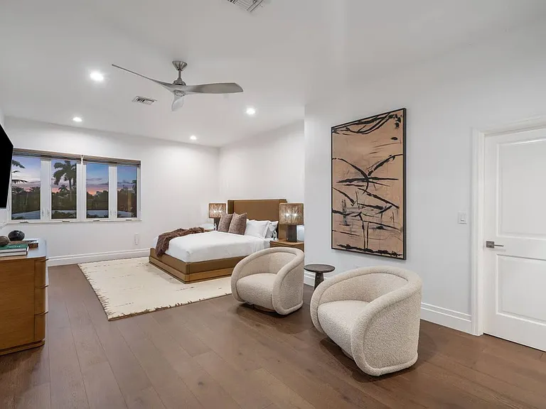 Retreat to the master suite's cozy nighttime ambiance.