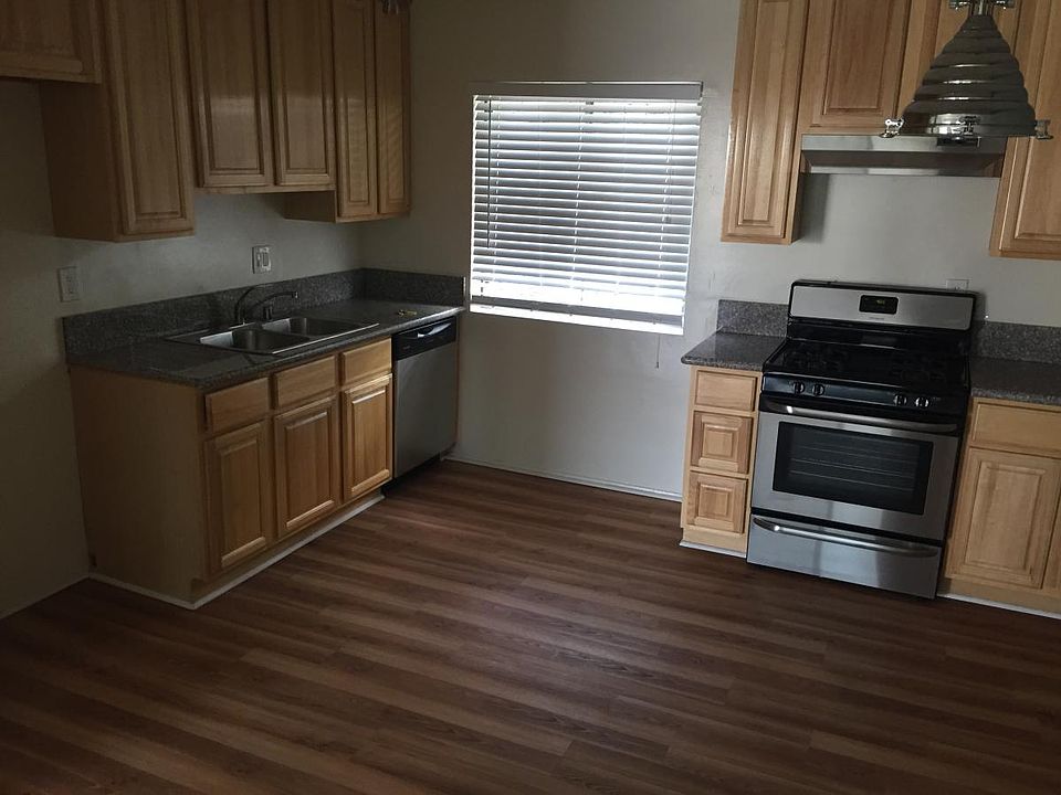 Reference photo (note apartment has tiled kitchen - not wood