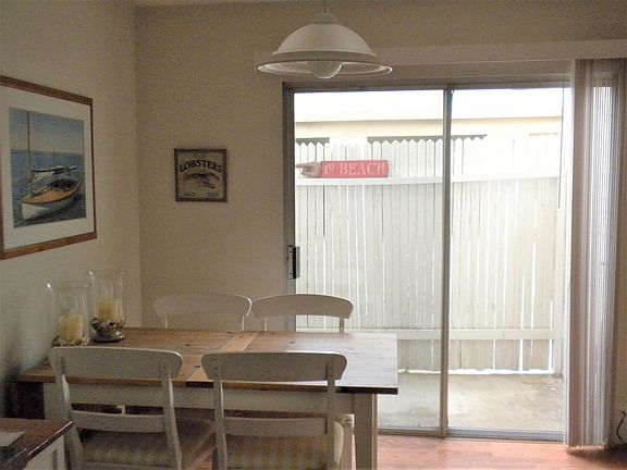 1st Level - Small enclosed patio accessible from Dining area