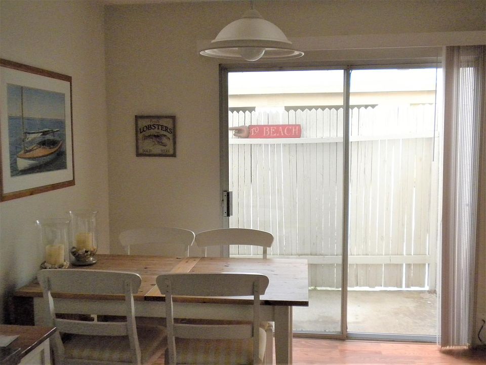 1st Level - Small fenced-in patio accessible from Dining area through sliding glass door.