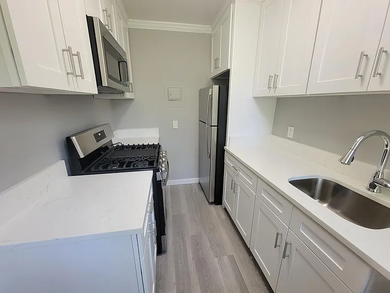 Brand New Kitchen with White Shaker Cabinets