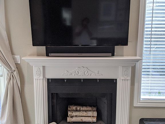 Fireplace. All data and power is hidden behind the TV.