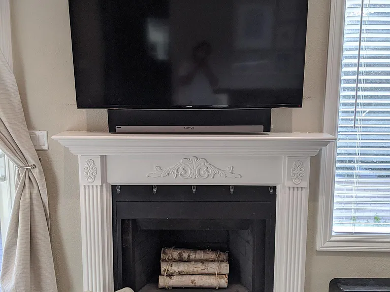 Fireplace. All data and power is hidden behind the TV.