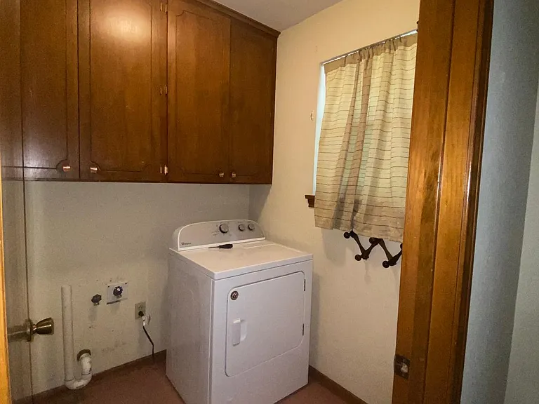 Washroom (Both a dryer and brand new washer are provided)