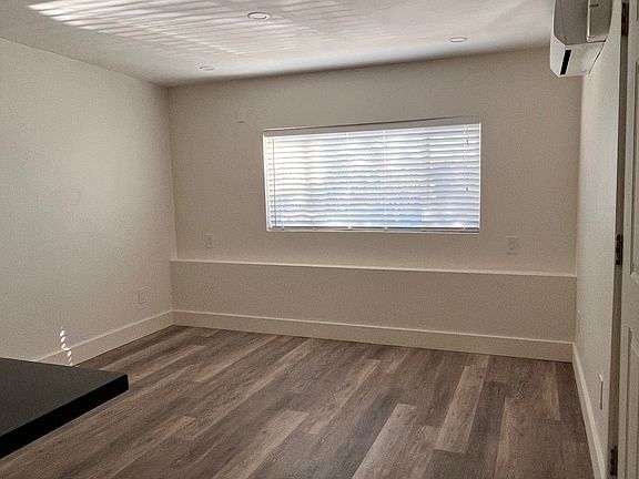 Living Area w/Picture Window & Blinds