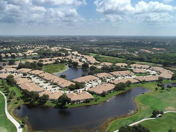 Home For Sale In PELICAN POINTE GOLF COUNTRY CLUB