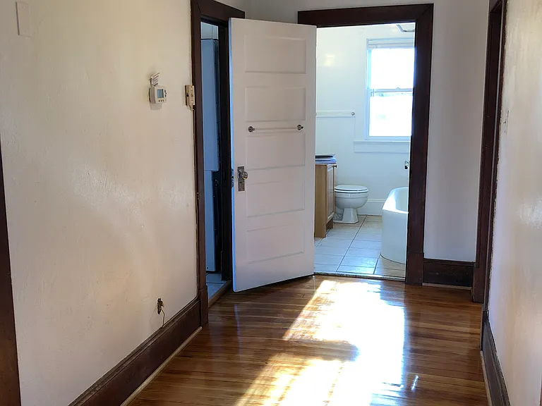 Hallway facing bathroom