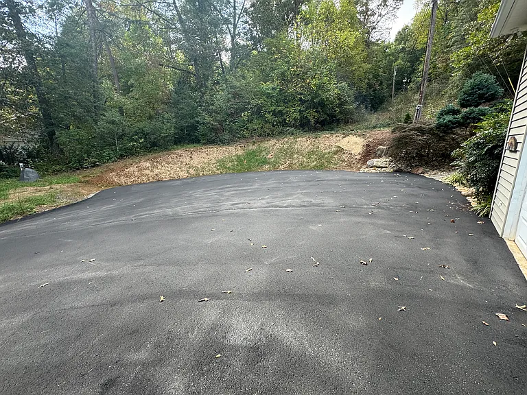 New driveway and bigger parking.