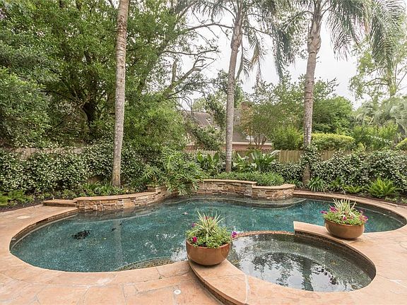 Pebble tec finish on pool makes for evening sparkles. Hot tub adds the warmth and comfort.