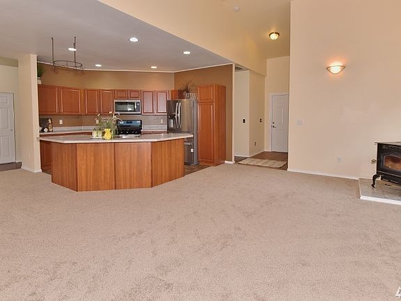 Just imagine all the entertaining you can do on this freshly painted back deck , or just kick back and relax.
