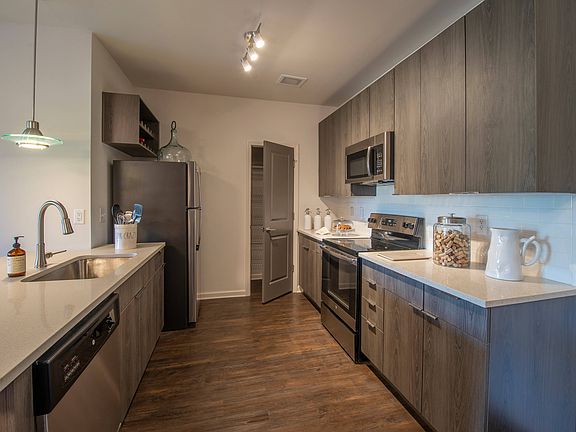 Kitchen with Updated Steel Appliances and Pantry
