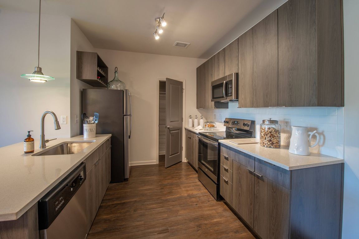 Kitchen with Updated Steel Appliances and Pantry