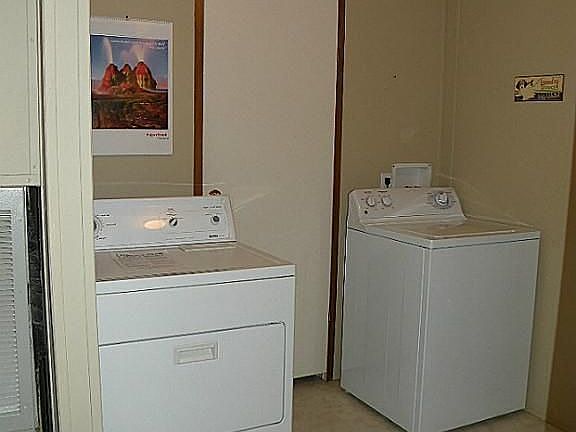 Utility area.  Washer and dryer stay.