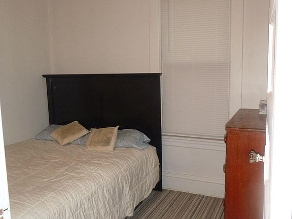 Bedroom 1 with Queen size bed and dresser. All 3 BRs are same size.