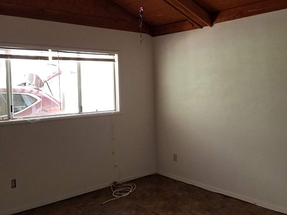 Master bedroom, vinyl floor and overhead fan