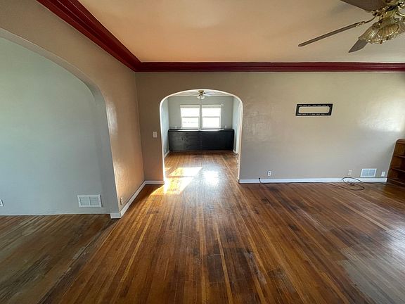 Looking into the dining room space with a built in hutch