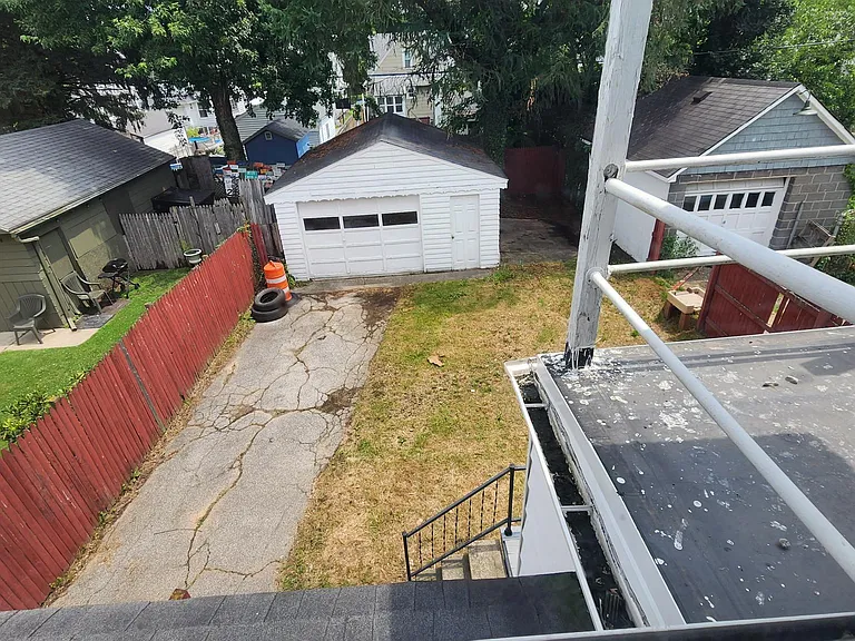 Large rear yard and full size 2 car garage