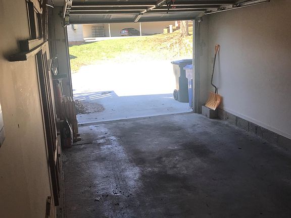 One attached garage, street parking for additional vehicle or visitors