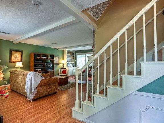 Upon entering you will immediately feel the warmth of this lovely home.