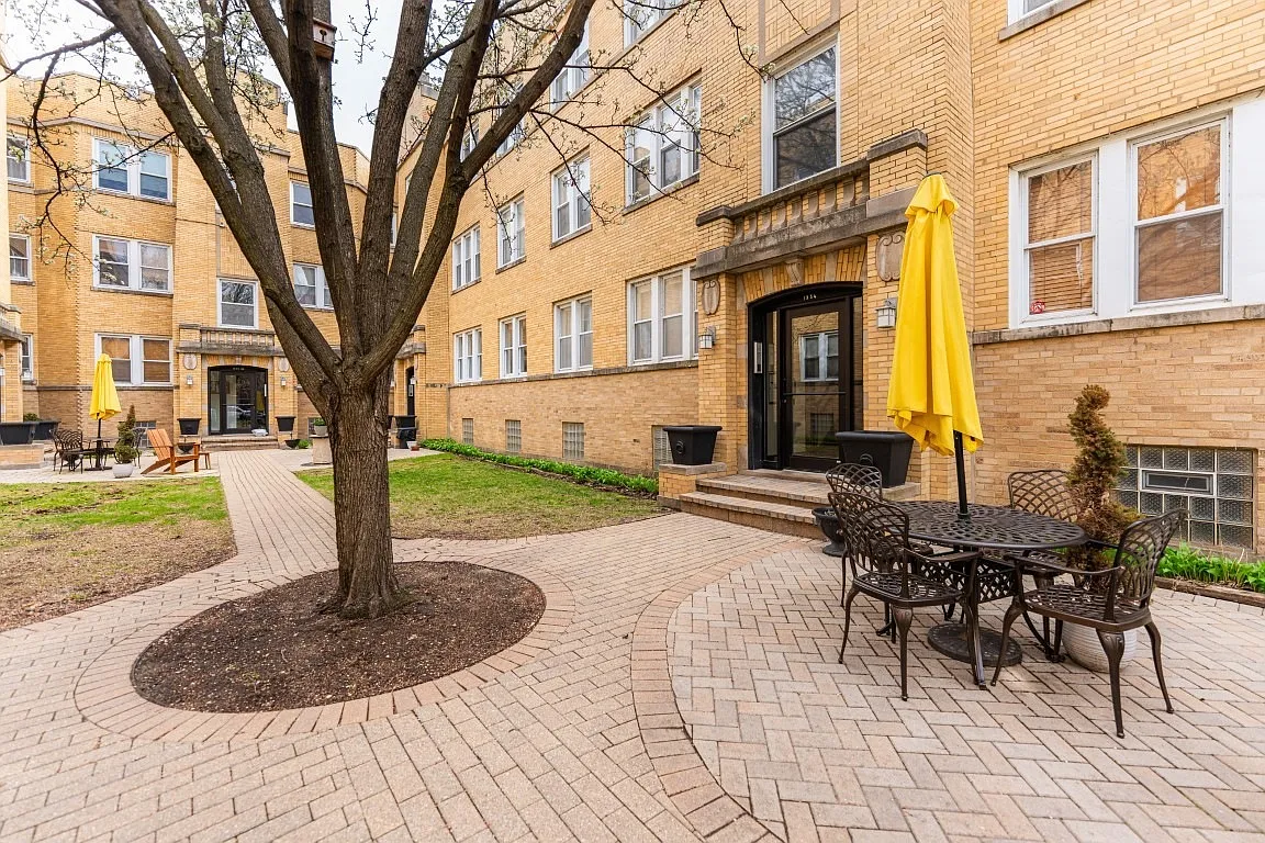 Building Photo - 1334 W Estes Ave #2S