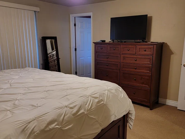 Master bedroom with door to Master bathroom