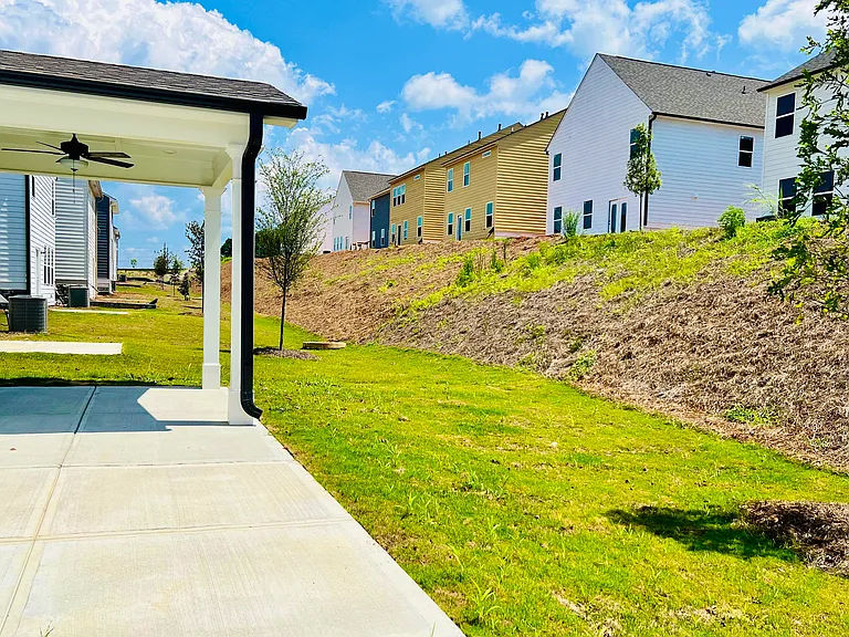 Backyard with Spacious Covered Porch and extended Patio