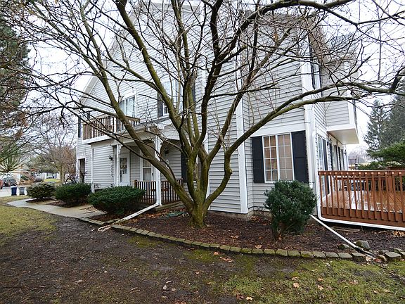 Beautiful Magnolia Accents the Home's Exterior
