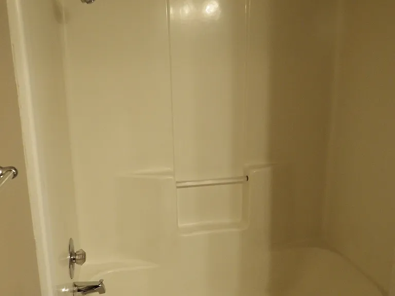 Hall bath with tub/shower.