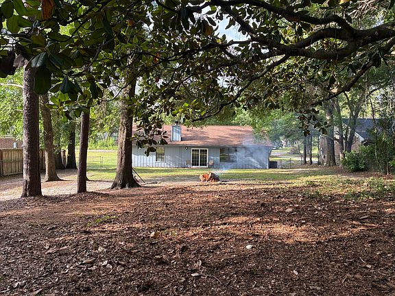 120'x75' fenced, shaded backyard