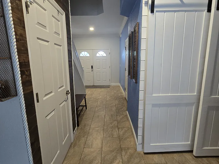 1st floor hallway. Under stair water heater closet. Washer/Dryer closet