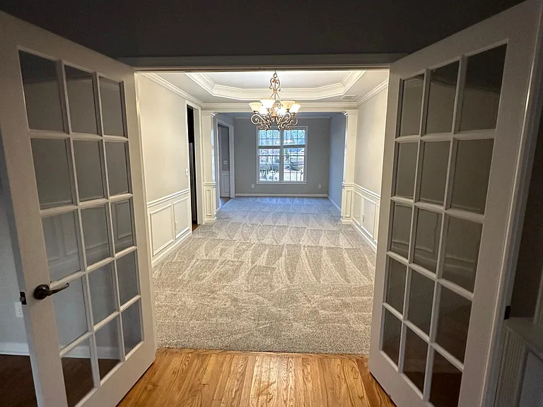 from sunroom into dining