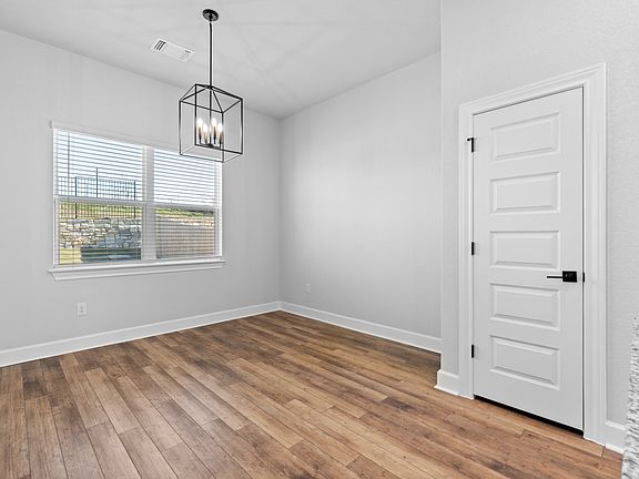 The dining room sits right off of the kitchen.