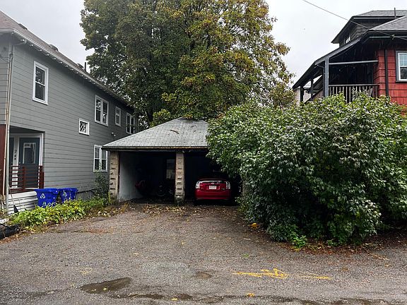 Garage behind house. Back porch is visible in the photo.