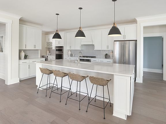 Open Kitchen with an oversized island perfect for additional seating opportunities and storage