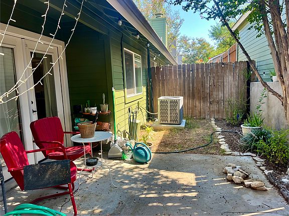 Private fenced patio with small yard area. Great for pets! Patio is partially covered.