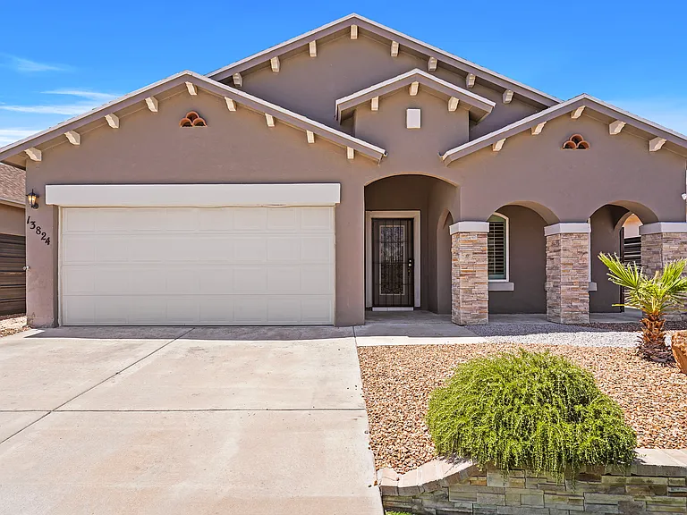 beautifully landscaped exterior. Low maintenance