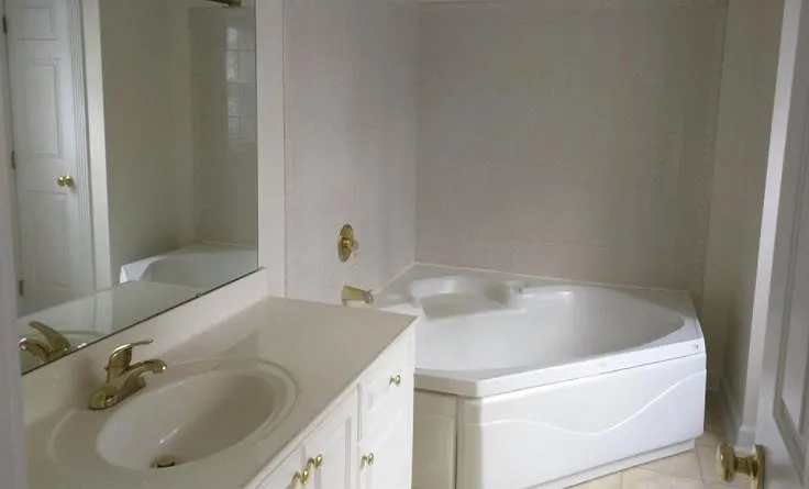 BIG bathtub in the Master Bath and HUGE WALK IN CLOSETS