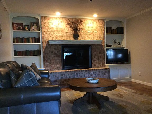 Den with great fireplace