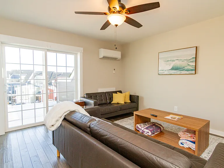 3rd floor includes another living room and walks out to a terrace.