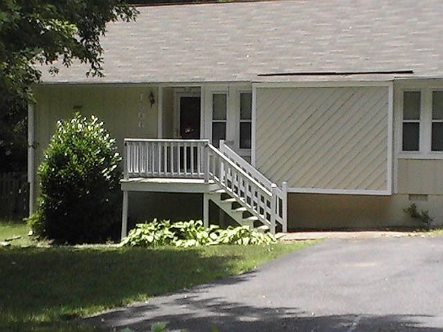 front of home, paved driveway for 4 cars
