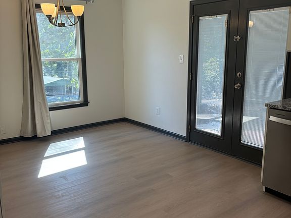 Eat-In Kitchen with French Doors leading to private patio!