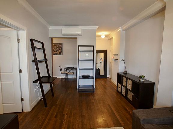 Living Room view of Kitchen and Entryway