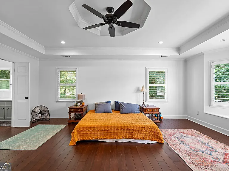 Master bedroom with bay window and bench, full master bath with spacious closet and large shower